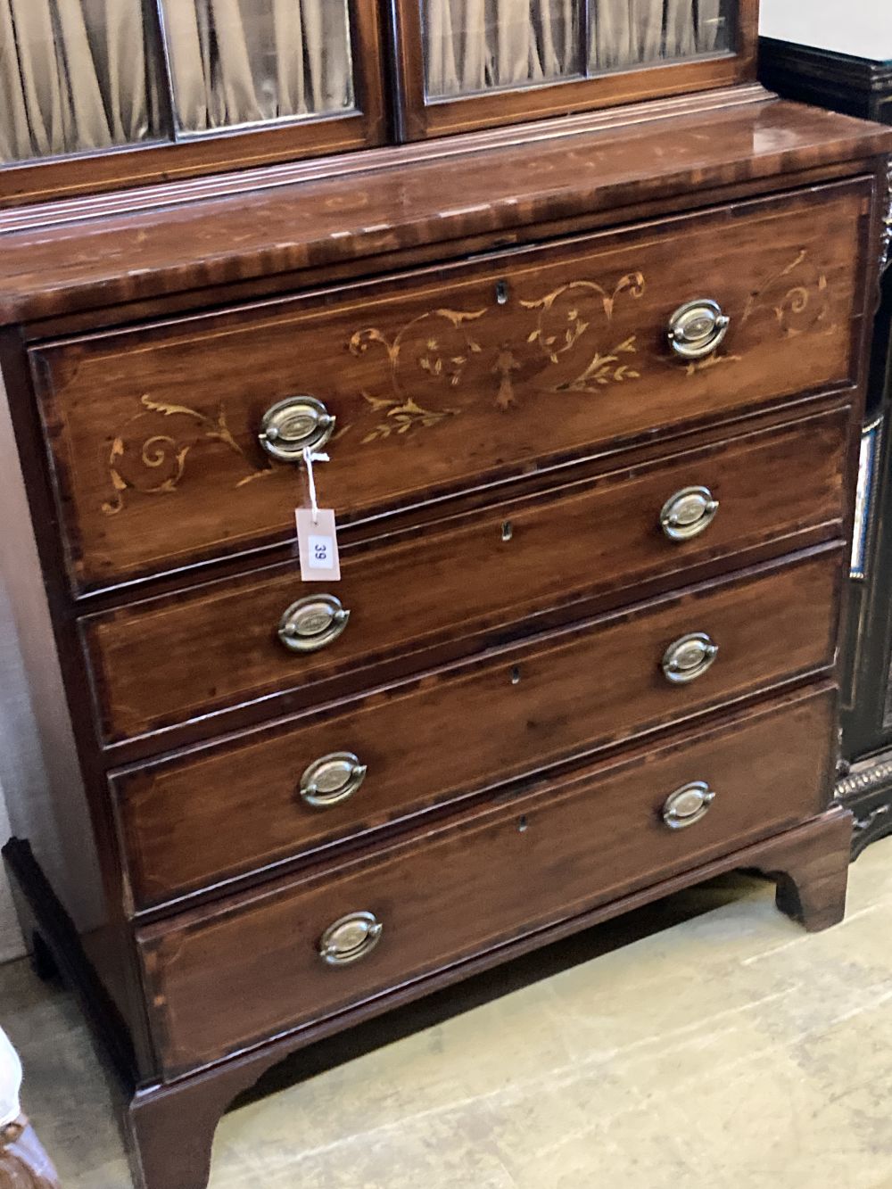 A George III mahogany secretaire bookcase, later inlaid, width 92cm, depth 48cm, height 210cm